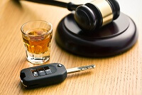 Alcohol, gavel and keys